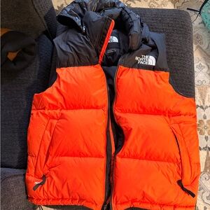The North Face Black and Orange Puffer vest
